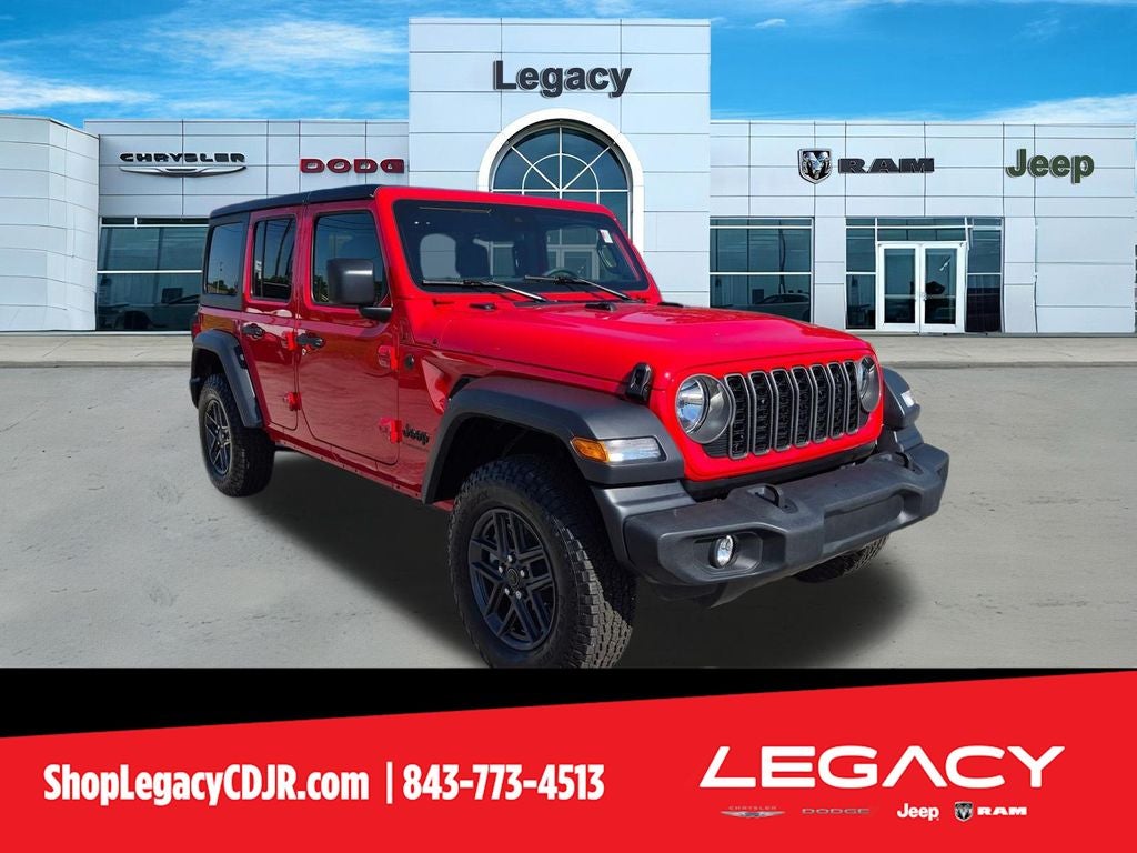 2025 Jeep Wrangler 4-Door Summit 4x4 in Firecracker Red Clearcoat — front three-quarter view
