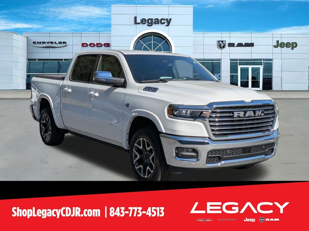 2026 RAM Ram 1500 RAM 1500 LARAMIE CREW CAB 4X4 5'7' BOX in Bright White Clear-Coat Exterior Paint — front three-quarter view