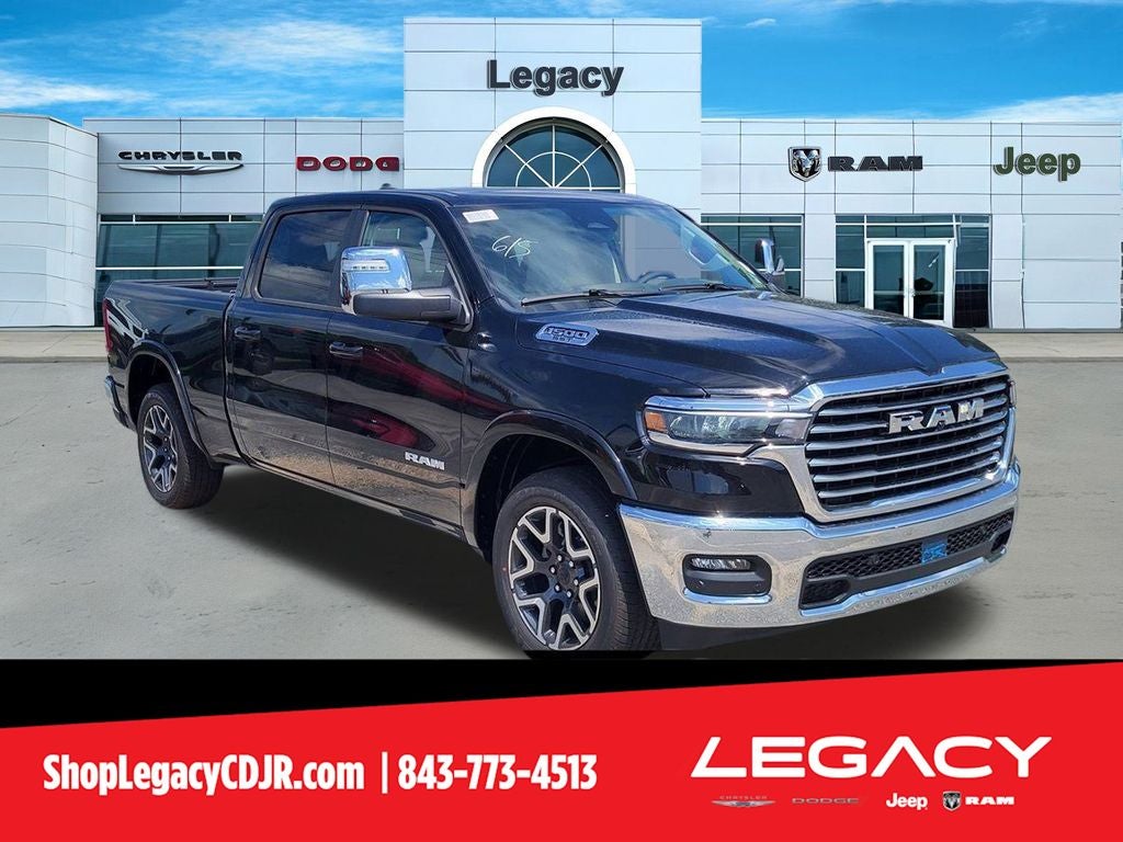 2025 RAM Ram 1500 RAM 1500 LARAMIE CREW CAB 4X4 6'4' BOX in Diamond Black Crystal Pearl-Coat Exterior Paint — front three-quarter view