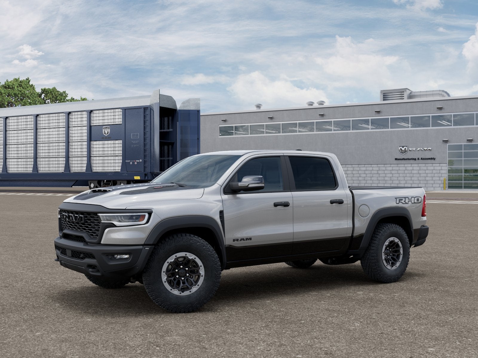 2026 RAM Ram 1500 RAM 1500 RHO CREW CAB 4X4 5'7' BOX in Silver Zynith Exterior Paint — front three-quarter view